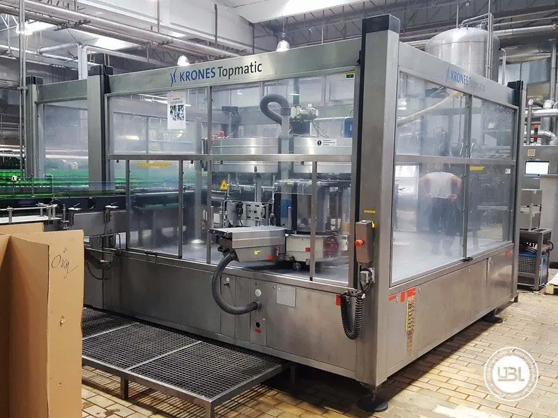 Photo #1 of Used Bottle Labeler Krones Topmatic 65000 bph year 2003
