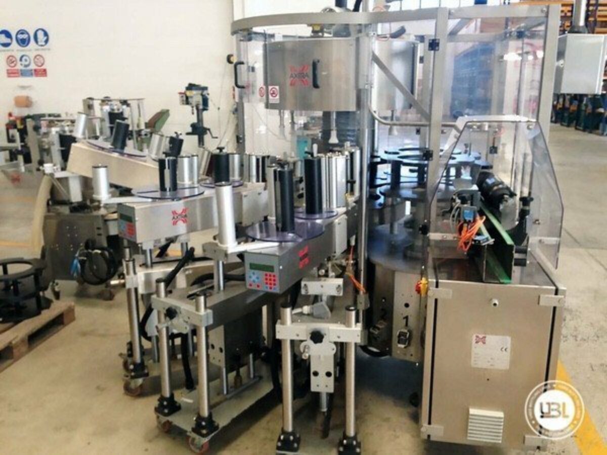 Photo #1 of Used Bottle Labeler Axtra 720-H6-SA3 5000 bph year 2012