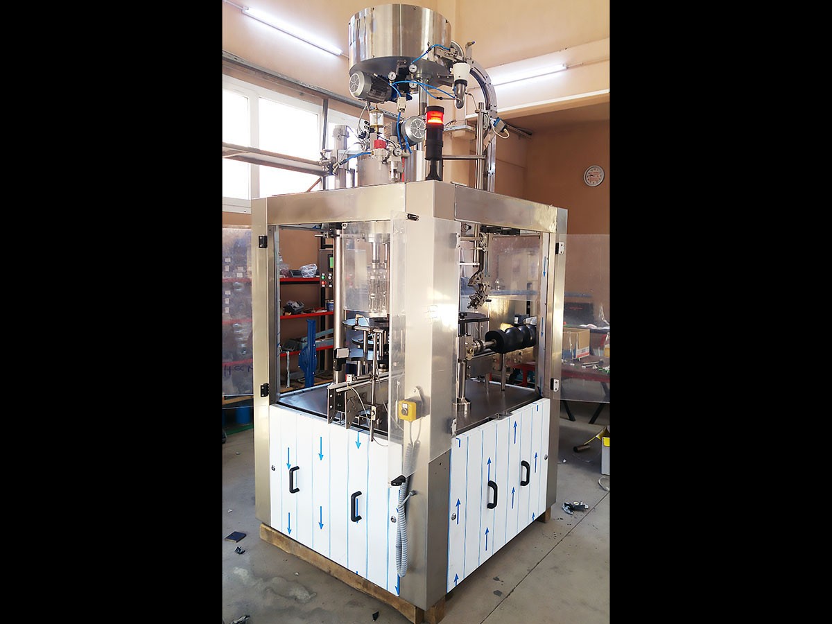 Photo #1 of Used Capping Machine 4 heads 8000 bph