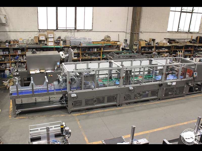 Photo #1 of Automatic Shrink Wrapper automatic overlapping film