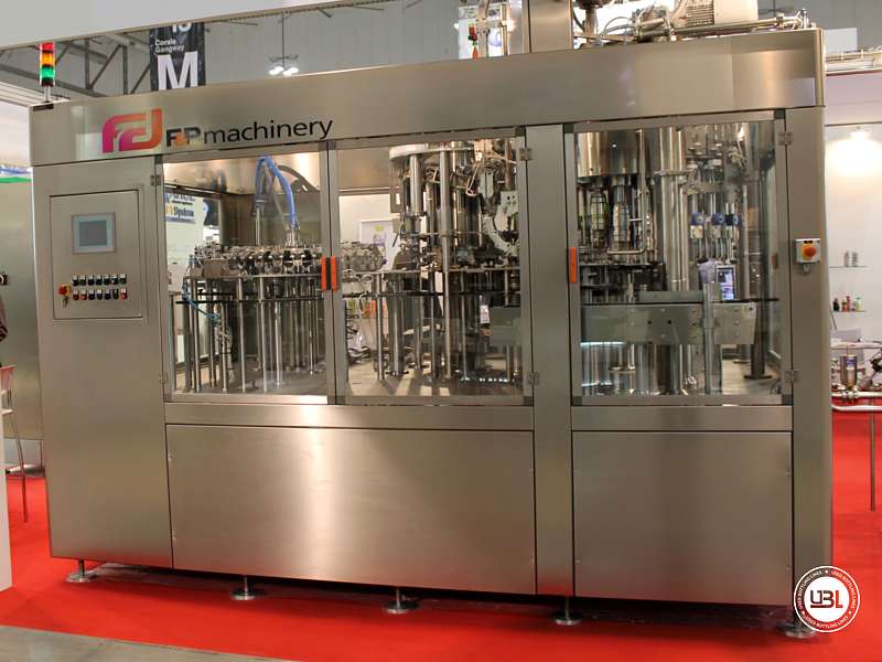 Photo #1 of Used Hot Filling Triblock F&P Machinery Unica HF glass-PET 24.8.24.6