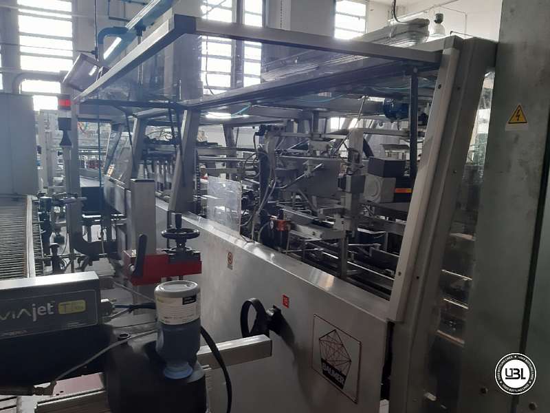 Photo #2 of Used Wrap Around Baumer Europea 510 with Divider Cosmopack