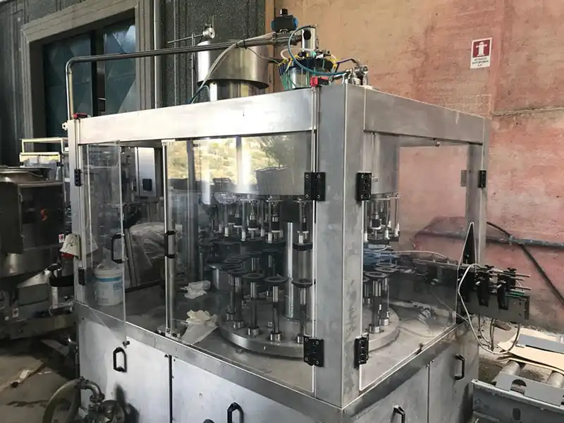 Photo #4 of Used Automatic Filling Monoblock Olive Oil 20-3 Brand Baratta 4500 bph