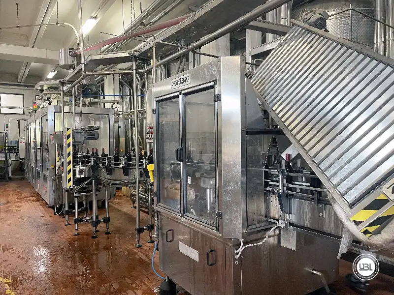 Photo #19 of Used Bertolaso Bottling Line for Sale 7000 bph – 1999