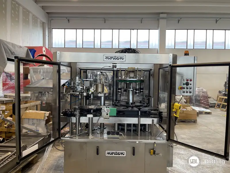 Photo #1 of Used Capsuling Machine Nortan Unicap 35T + Aurora 1999