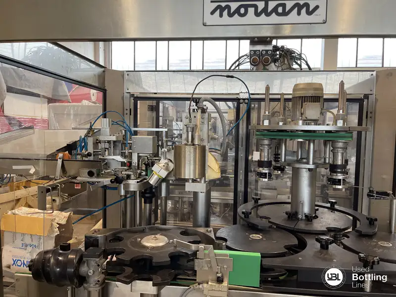 Photo #2 of Used Capsuling Machine Nortan Unicap 35T + Aurora 1999