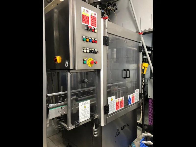 Photo #1 of Used Arol Capping Machine 6 heads aluminum screw 9000 bph