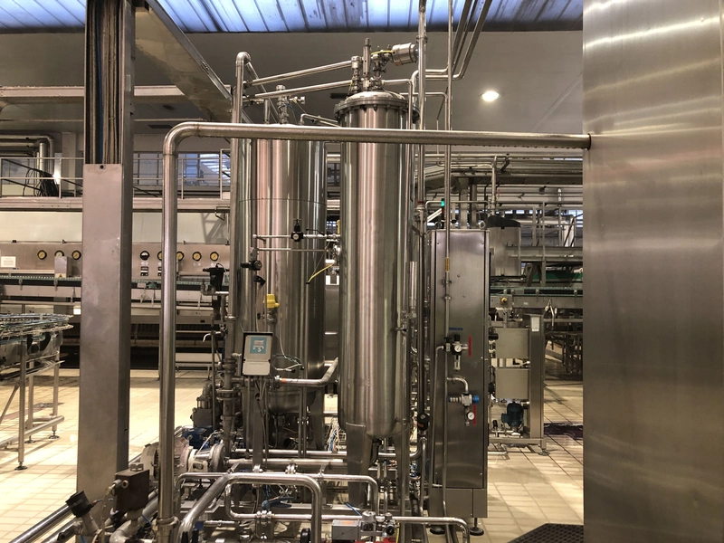 Photo #4 of Complete mixed new-used PET bottling line for CSD 25000 bph