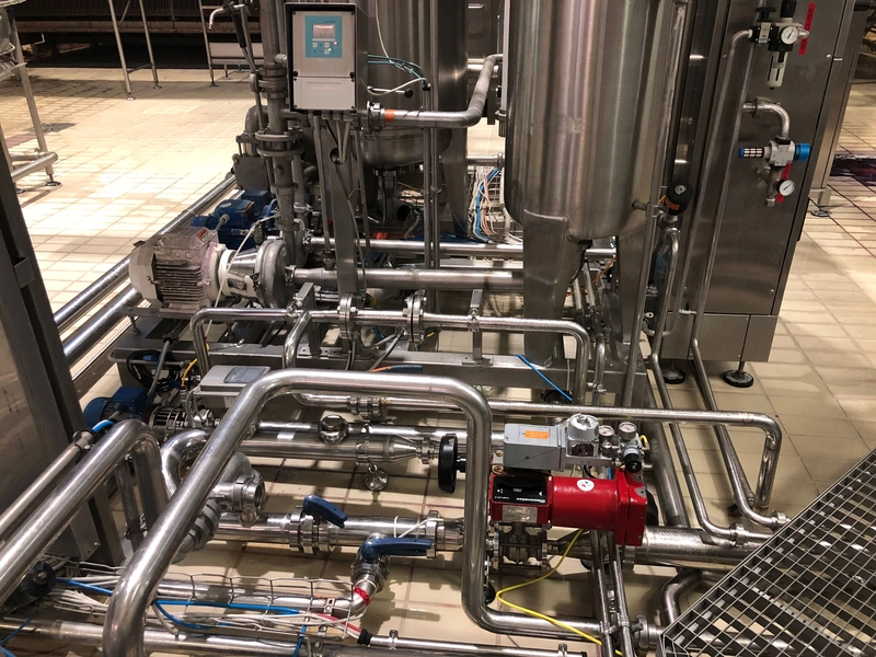 Photo #5 of Complete mixed new-used PET bottling line for CSD 25000 bph