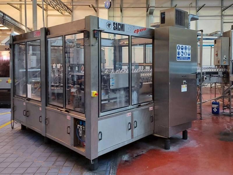 Photo #9 of Complete mixed new-used PET bottling line for CSD 25000 bph