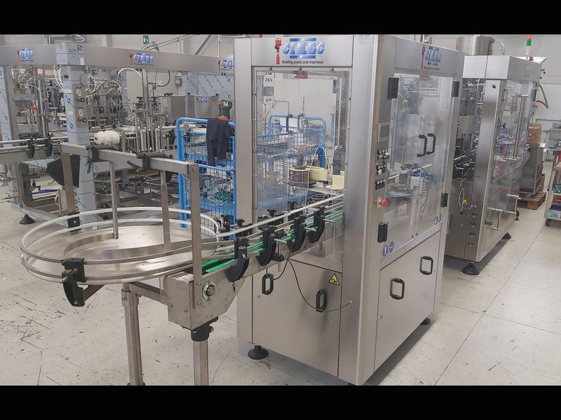 Photo #1 of Used bottling line CIMEC for beer in glass bottles 1500 bph