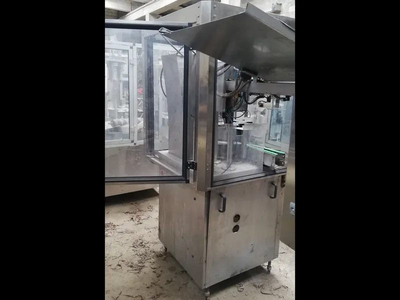 Photo #3 of Used Capsuling Machine Nortan UNICAP 35 S+R up to 1000 bph