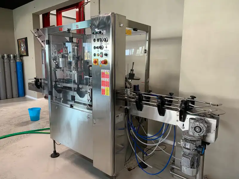 Photo #1 of Used Labeling Machine ENOS T4 with shrink capsuler 1200 bph