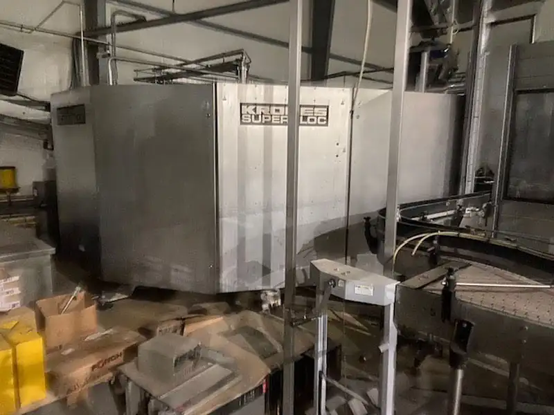 Photo #21 of Used Bottling Line KRONES for still, sparkling water and CSD 12000 bph