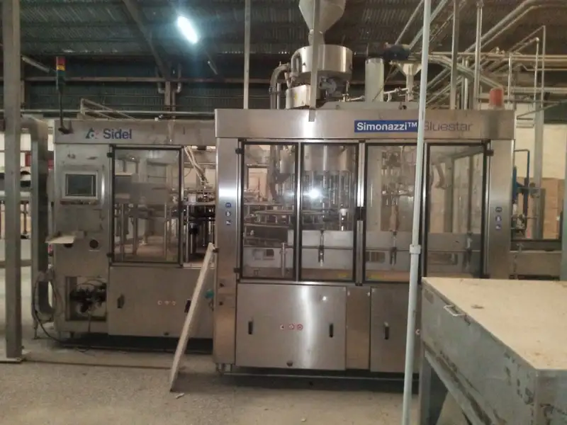 Photo #6 of Used complete isobaric bottling line for CSD 6400 bph