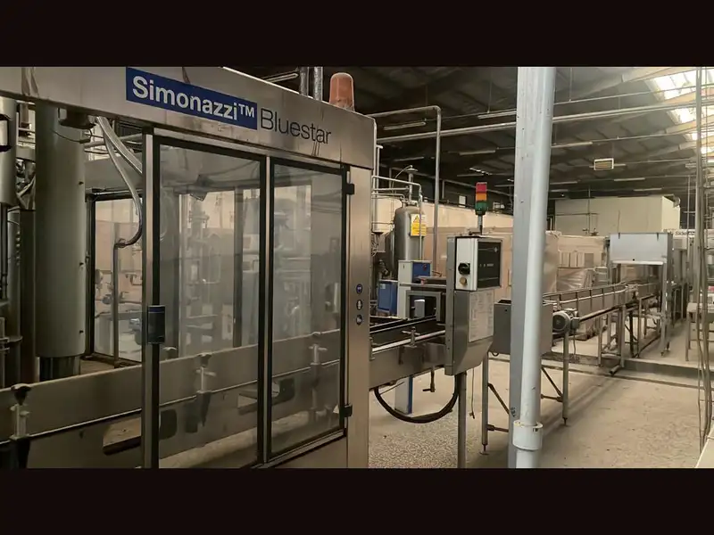 Photo #7 of Used complete isobaric bottling line for CSD 6400 bph