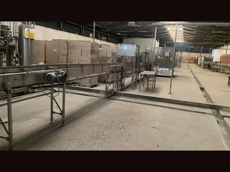 Photo #32 of Used complete isobaric bottling line for CSD 6400 bph