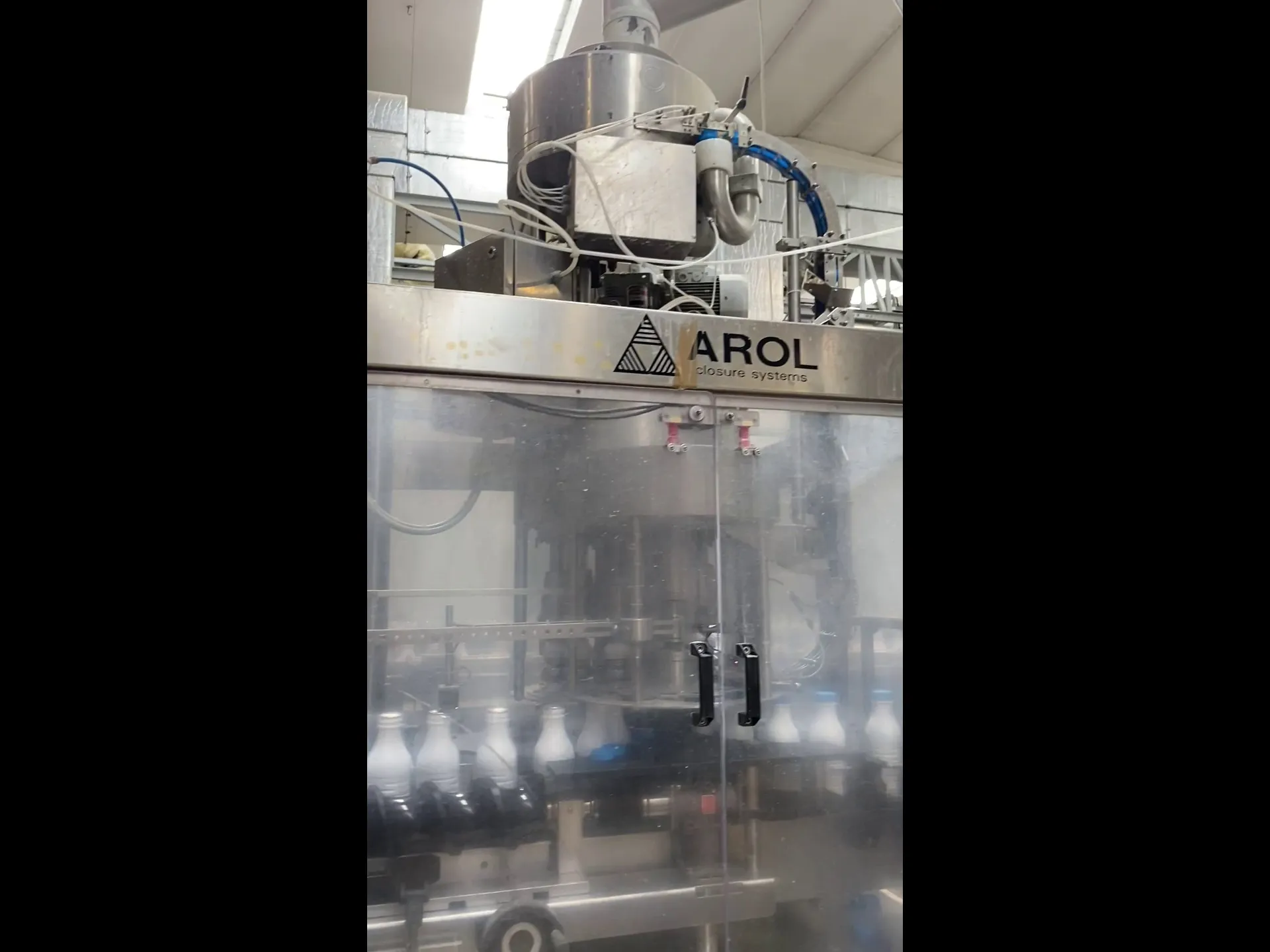 Photo #4 of Used AROL Capping Machine 12 heads 24000 bph