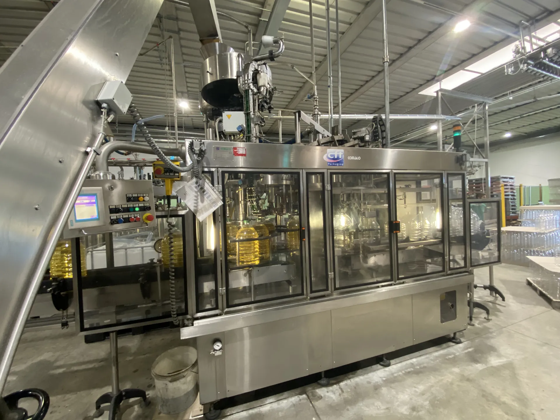 Photo #2 of Used CFT Oil Filling Monoblock – Comaco 6000 bph