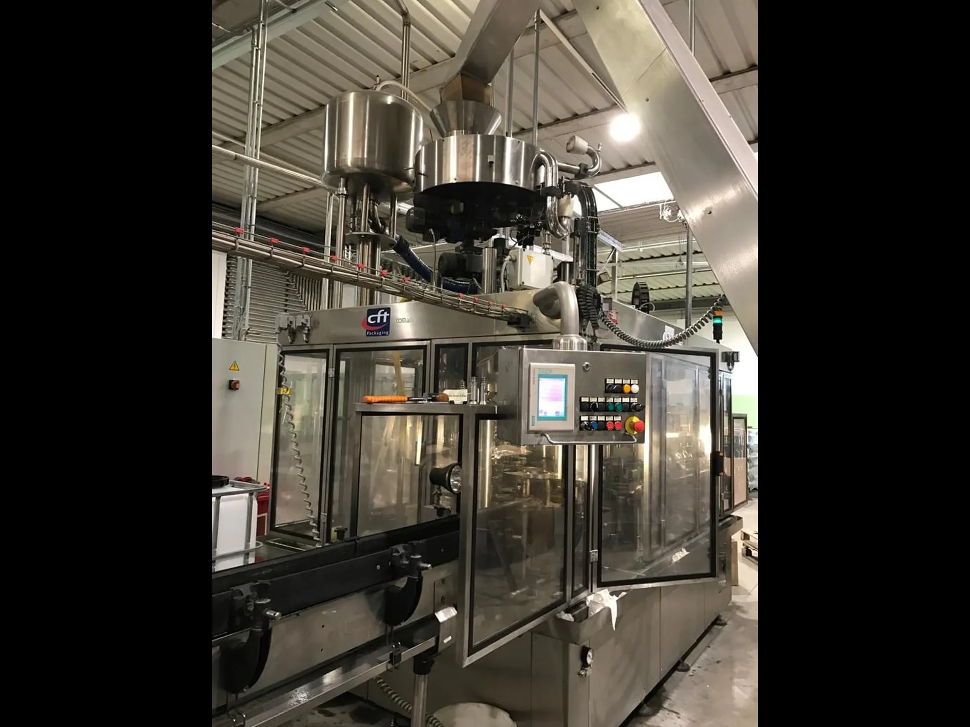 Photo #3 of Used CFT Oil Filling Monoblock – Comaco 6000 bph