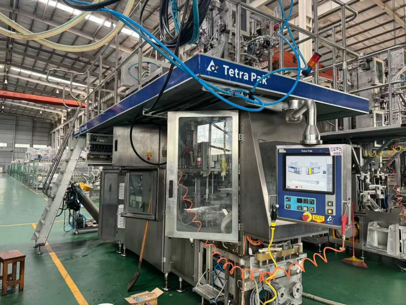 Photo #7 of Used Complete Bottling line 330 ml Prisma Tetra Pak